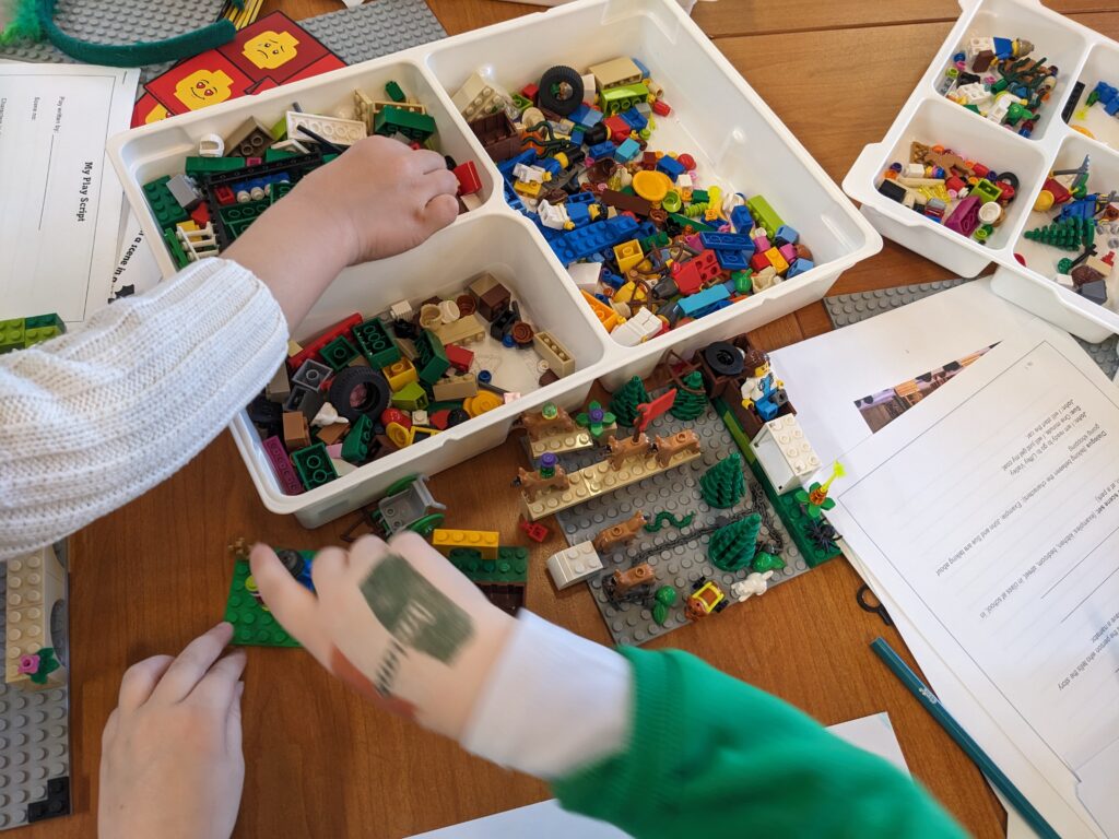Photo of children playing with a box of lego